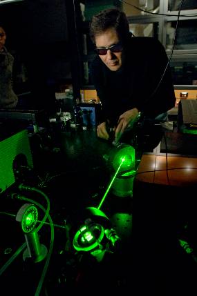 Marcos Dantus in his lab running an ultrafast laser experiment.