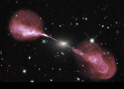The new project led by Michigan State University will allow researchers to better understand plasma jets and their role in regulating galaxies. The jets seen here in red measure about a million light-years across and are being created by a supermassive black hole at the core of the galaxy seen in the center of the image, Hercules A. 